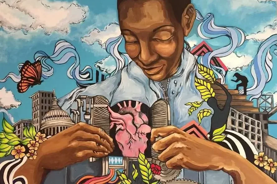 Vibrant mural of a person connecting buildings, heart, and nature, symbolizing harmony between urban life and nature.